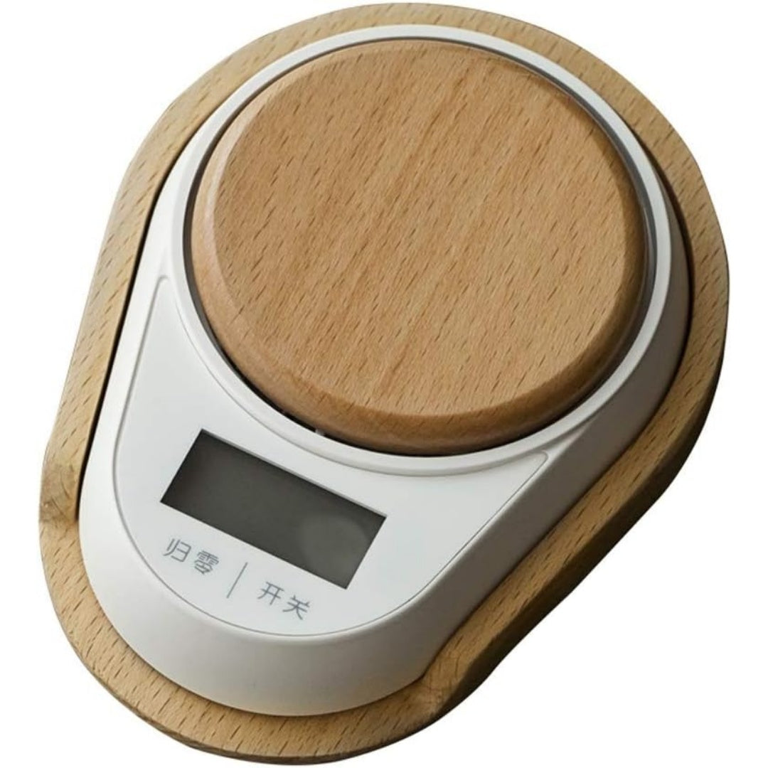 Quantita degli alimenti lette sul display di colore beige e con indicatore digitale